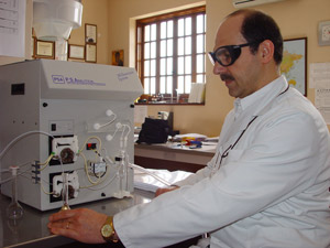 Dr. Georgiou working on an AF Spectrometer for Hg